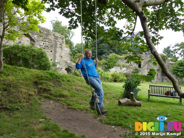 FZ018822 Marijn on rope swing in Usk Castle